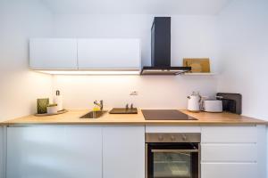Kuchyň nebo kuchyňský kout v ubytování Mari House