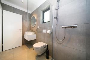 Koupelna v ubytování Mari House