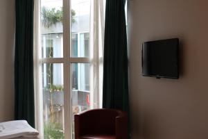 TV o dispositivi per l'intrattenimento presso Pronova Hotell & Vandrarhem
