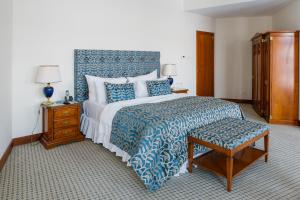 Postel nebo postele na pokoji v ubytování Vilnius Grand Resort