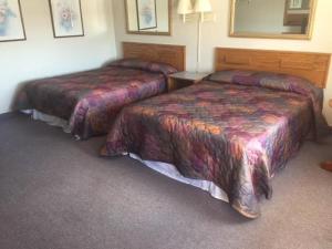 Big South Fork Trail Lodge tesisinde bir odada yatak veya yataklar