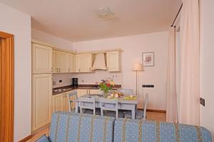 Kuchyň nebo kuchyňský kout v ubytování Residence Besass, GTSGroup