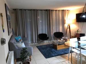 TV a/nebo společenská místnost v ubytování Vista Laguna Apartment