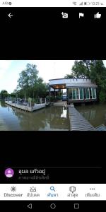 a picture of a building on a body of water at Baan Bon Resort Bang Tabun in Phetchaburi