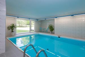 Πισίνα στο ή κοντά στο Zuhause in den Alpen Ihre Ferienwohnung mit Hallenbad und Sauna