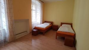 Posteľ alebo postele v izbe v ubytovaní Apartmány - Vidnava