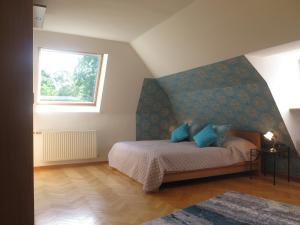 Posteľ alebo postele v izbe v ubytovaní Schoenbrunn Gardens Deluxe Apartment