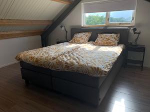 Кровать или кровати в номере Mae Usu