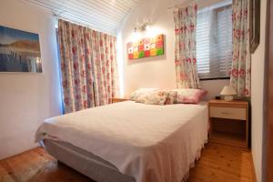 Posteľ alebo postele v izbe v ubytovaní Guest House Villa Barbara + 32 fotografií