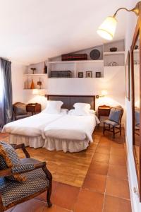 Ein Bett oder Betten in einem Zimmer der Unterkunft Hotel Spa Salinas de Imón
