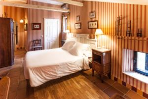 Ein Bett oder Betten in einem Zimmer der Unterkunft Hotel Spa Salinas de Imón