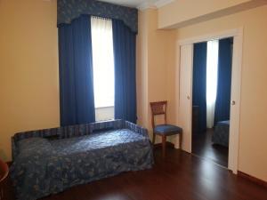 Postel nebo postele na pokoji v ubytování Albergo Costantini