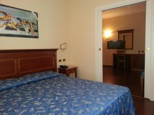 Postel nebo postele na pokoji v ubytování Albergo Costantini