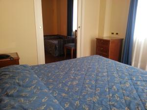 Postel nebo postele na pokoji v ubytování Albergo Costantini