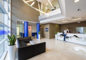 a lobby of a building with people in it at Camplus Guest Turro Casa per Ferie in Milan