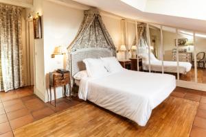 Ein Bett oder Betten in einem Zimmer der Unterkunft Hotel Spa Salinas de Imón