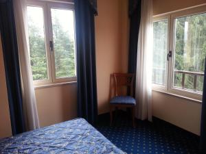 Postel nebo postele na pokoji v ubytování Albergo Costantini
