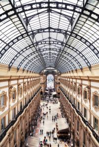 a view of a large building with a glass ceiling at Galleria Vik Milano in Milan