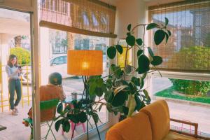 Vonkajšia záhrada v ubytovaní Blai Blai Hostel