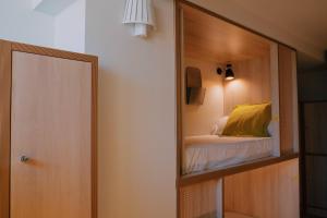 Posteľ alebo postele v izbe v ubytovaní Blai Blai Hostel
