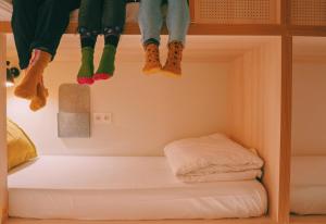 Posteľ alebo postele v izbe v ubytovaní Blai Blai Hostel