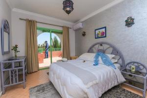 Postel nebo postele na pokoji v ubytování In Club Palmeraie Resorts + 37 fotografií