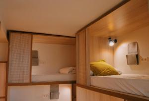 Posteľ alebo postele v izbe v ubytovaní Blai Blai Hostel