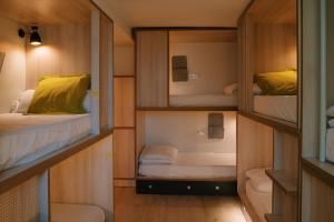 Posteľ alebo postele v izbe v ubytovaní Blai Blai Hostel