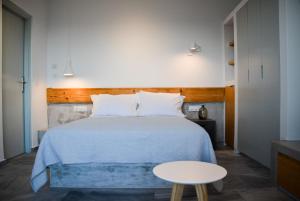 Postel nebo postele na pokoji v ubytování Pharos Apartments
