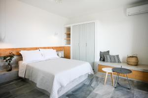 Postel nebo postele na pokoji v ubytování Pharos Apartments