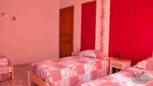 Postel nebo postele na pokoji v ubytování Gîte ferme du moulin