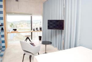 TV o dispositivi per l'intrattenimento presso Placid Hotel Design & Lifestyle Zurich