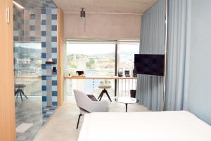 TV o dispositivi per l'intrattenimento presso Placid Hotel Design & Lifestyle Zurich
