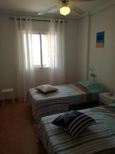 Katil atau katil-katil dalam bilik di Appartement Mojacar Playa Marina de la Torre