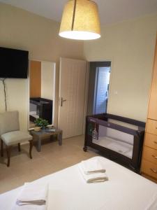 A bed or beds in a room at Myrto2 apartment