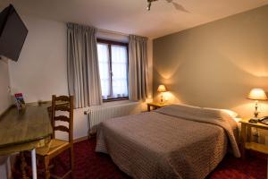 Postel nebo postele na pokoji v ubytování Hotel Beysang