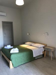 Postel nebo postele na pokoji v ubytování Le Camere Di Don Vito
