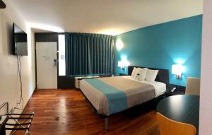 Ένα ή περισσότερα κρεβάτια σε δωμάτιο στο Motel 6-Nashville, TN - Airport +29 φωτογραφίες