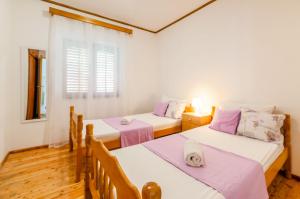 Postel nebo postele na pokoji v ubytování Tomas Apartment no.1