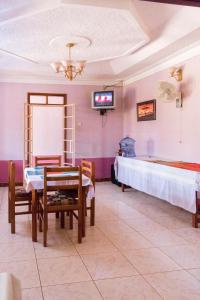 Postel nebo postele na pokoji v ubytování Starlight Hotel Mbale