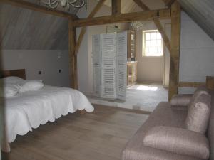 Postel nebo postele na pokoji v ubytování B&B Hoeve Ransberg