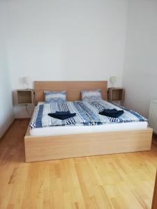 Posteľ alebo postele v izbe v ubytovaní Apartmány pod Divadlem