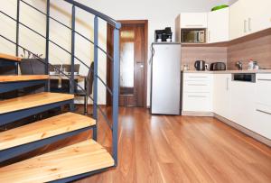 Kuchyň nebo kuchyňský kout v ubytování Apartmán U Sikorek