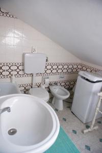 Koupelna v ubytování Mansardato In Lurisia