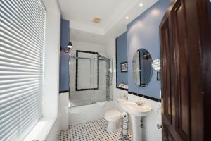 Um banheiro em Manoir Sherbrooke