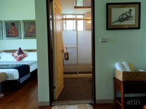 Postel nebo postele na pokoji v ubytování Yi Tian Homestay