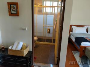 Postel nebo postele na pokoji v ubytování Yi Tian Homestay