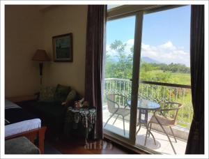 Balkón nebo terasa v ubytování Yi Tian Homestay