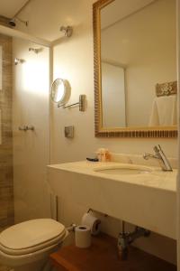 Kúpeľňa v ubytovaní Pousada Conca di Mare - Restaurante - Pé na areia com serviço de praia