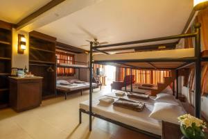 Postel nebo postele na pokoji v ubytování West 35 Eco Mountain Resort + 5 fotografií